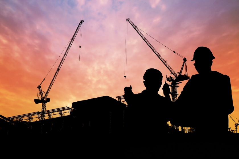 business insurance for contractors showing construction silhouette
